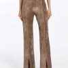 Brown suede pants with slits.