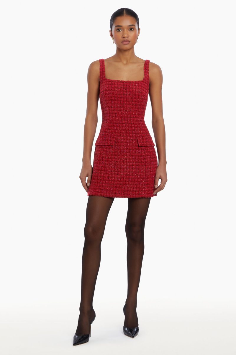 Girl in red houndstooth dress, front facing.